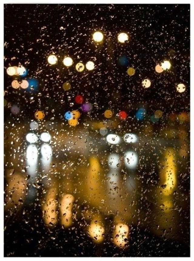 下雨的图片唯美城市