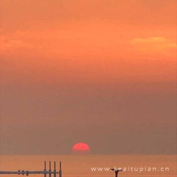 超美日落夕阳风景图真实，太阳日落的景色的图片